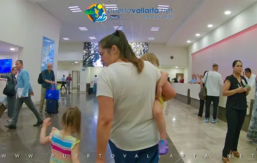 Timeshare sales corridor inside Puerto Vallarta airport after customs